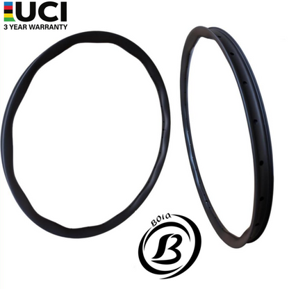 29er Carbon MTB Rim by Bola, featuring a wide wave profile, 36mm outer, 30mm inner width, and 28-spoke design.