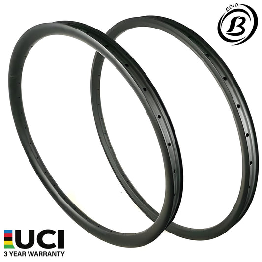 27.5" Superlight Carbon MTB Rim set, 34mm inner width, 30mm height, designed for XC and trail use, featuring UCI logo and war