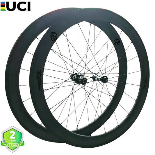 38mm Carbon Tubeless Road Wheelset, 700C, 25mm wide, rim brake, lightweight design, includes 2-year warranty icon.
