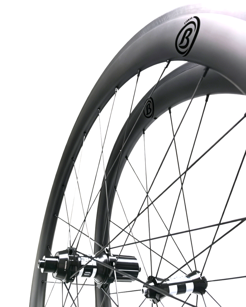 700C 38mm carbon rim brake wheelset with DT350 hubs, 25mm wide, featuring a sleek design and tubeless-ready capability.