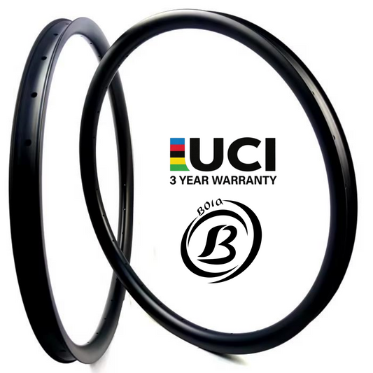700c Asymmetric Tubeless Ready Carbon Rim, 35mm deep, 24mm inner width, featuring UCI logo and 3-year warranty.